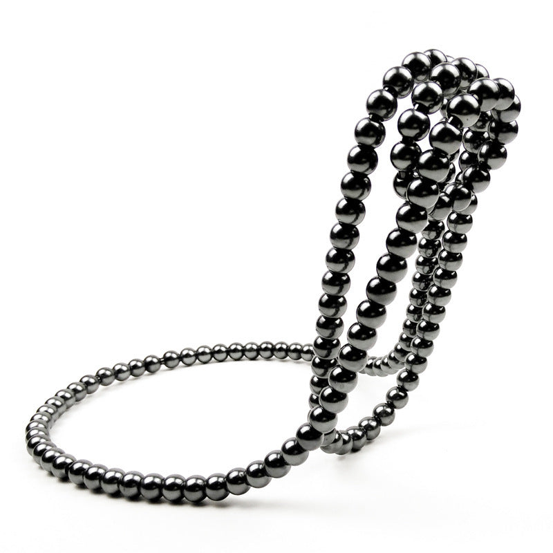 “Pearl Necklace” Suspended Wine Bottle Holder in White Gold or Black