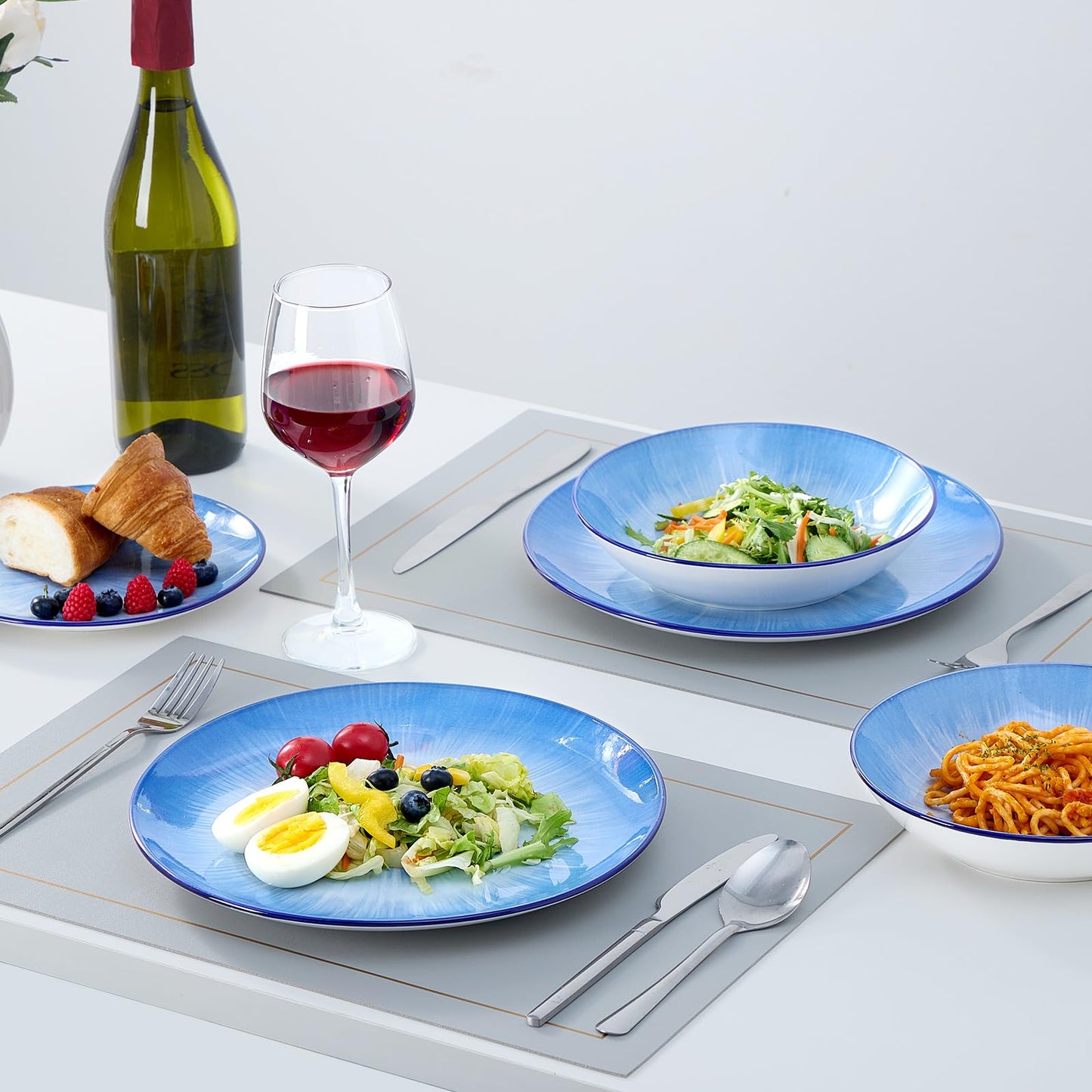 Bestone 12 Piece Round Kitchen Dinnerware Set,Plates and Bowls sets,Dishes, Plates, Bowls, Dish Set,Plates and Bowls,Service for 4, Chip Resistant Porcelain,Starburst Blue