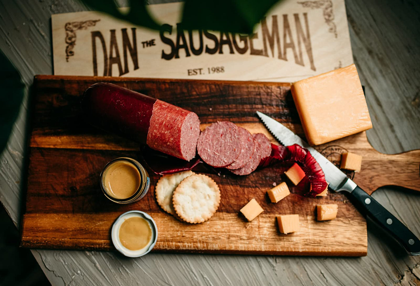 Dan the Sausageman's Favorite Gourmet Gift Basket Featuring Naturally Smoked Summer Sausages, Savory SeaBear Salmon, Wisconsin Cheese, Sweet Hot Mustard, and Keepsake Wood Pine Crate. Gift Messaging Available